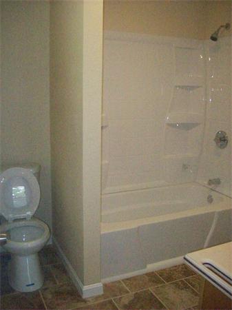 62 Palmer Road Monson, MA 01057 - Photo 8 of 17 a bathroom with a toilet and a shower