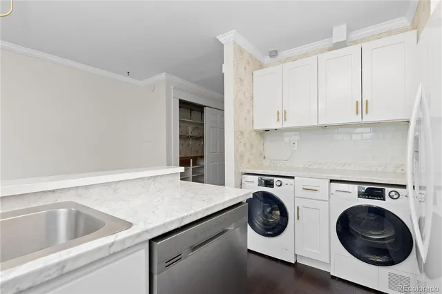 a bathroom with a sink toilet and tub
