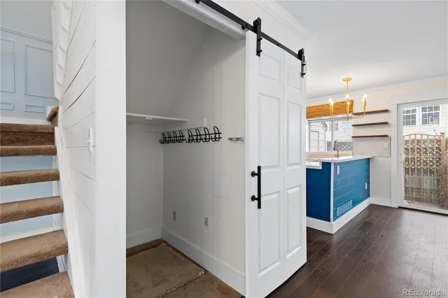 a bathroom with a sink a toilet and vanity