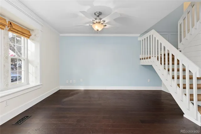 a view of a dining room with furniture and window