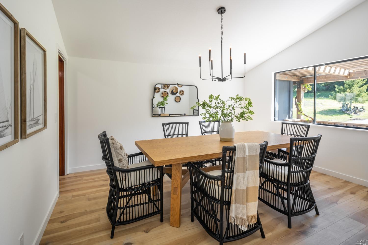 5757 Lucas Valley Road Nicasio, CA 94946 - Photo 14 of 60 a view of a dining room with furniture window and outside view