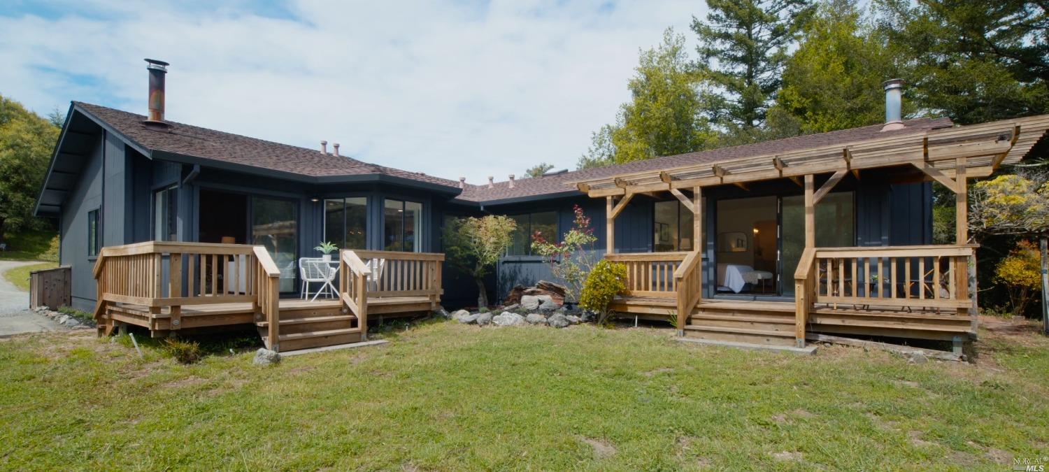 5757 Lucas Valley Road Nicasio, CA 94946 - Photo 2 of 60 a view of a chair and tables in the back yard of the house