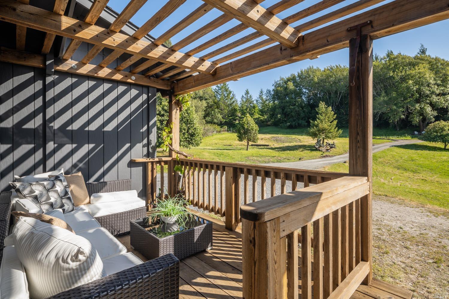 5757 Lucas Valley Road Nicasio, CA 94946 - Photo 3 of 60 a view of porch with a table and chairs