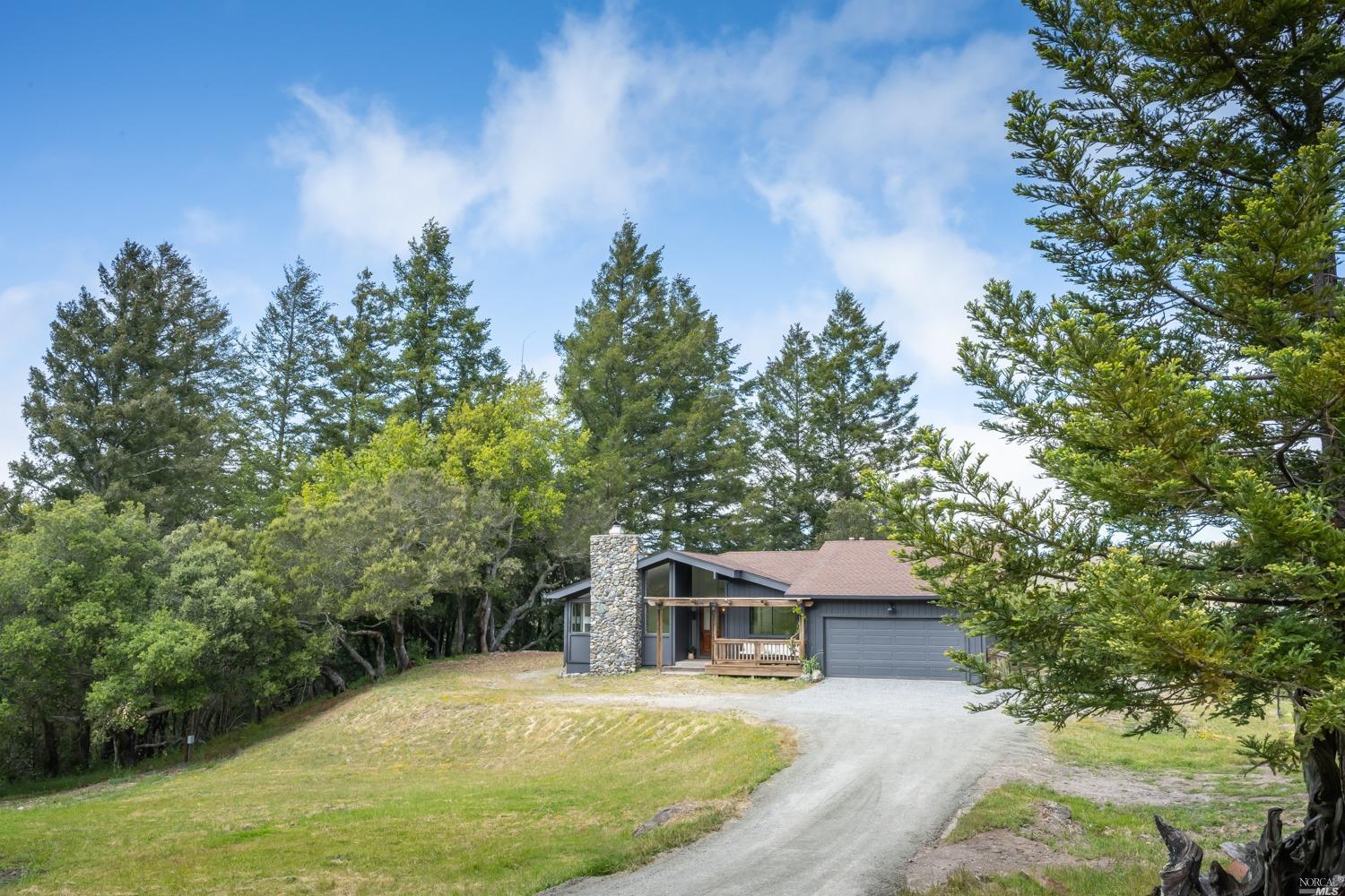 5757 Lucas Valley Road Nicasio, CA 94946 - Photo 36 of 60 a view of a house with a yard