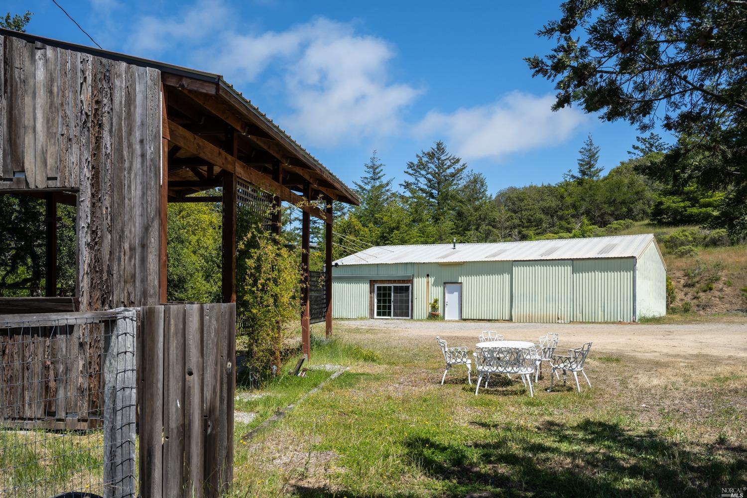 5757 Lucas Valley Road Nicasio, CA 94946 - Photo 38 of 60 a view of a house with backyard and sitting area