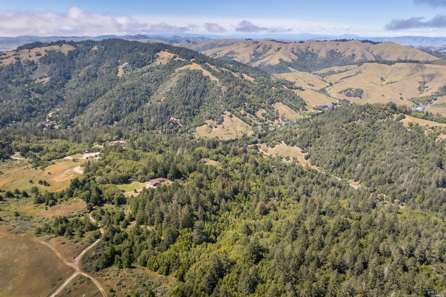 5757 Lucas Valley Road Nicasio, CA 94946 - Photo 60 of 60 a view of a city with mountains in the background