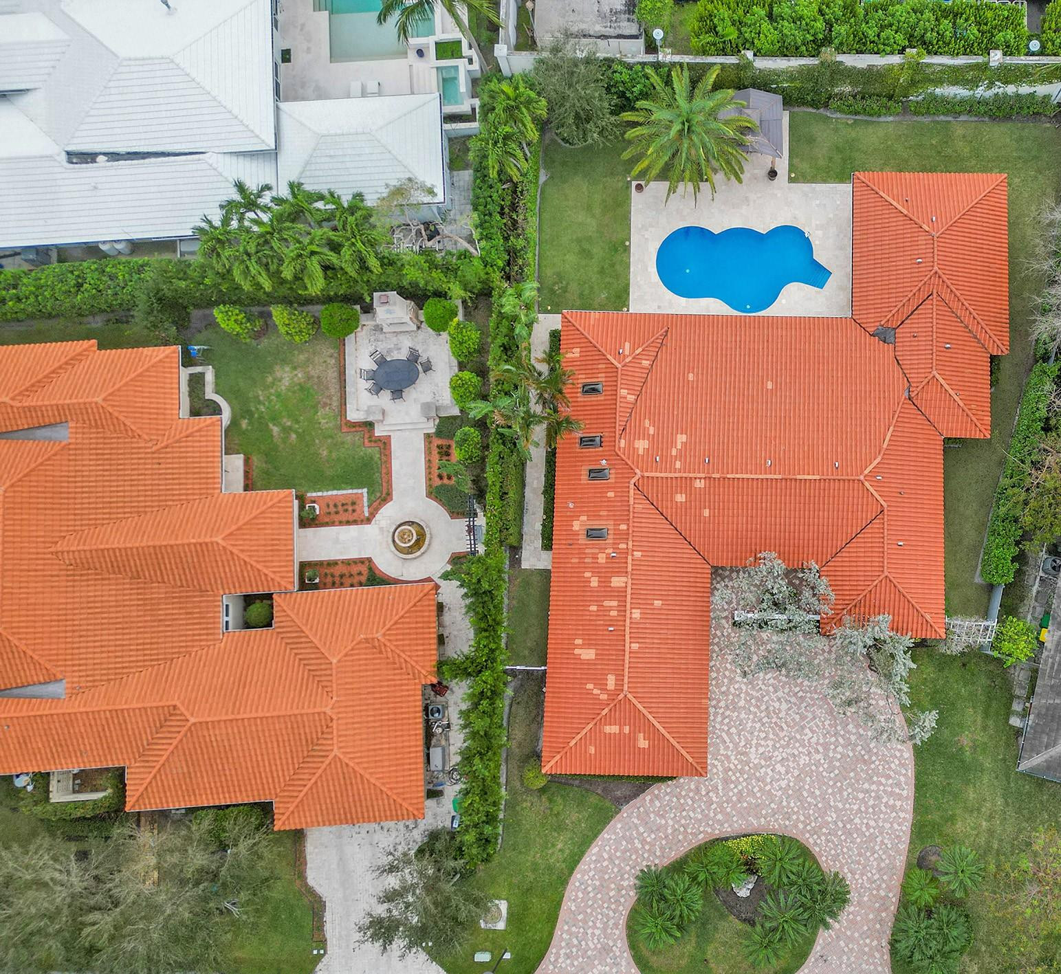 2 Minnetonka Road Sea Ranch Lakes, FL 33308 - Photo 3 of 43 an aerial view of house with yard swimming pool and outdoor seating