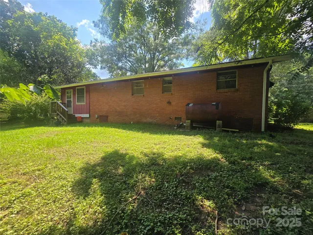 a view of a backyard with a garden