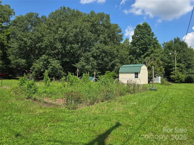 a house view with a garden space