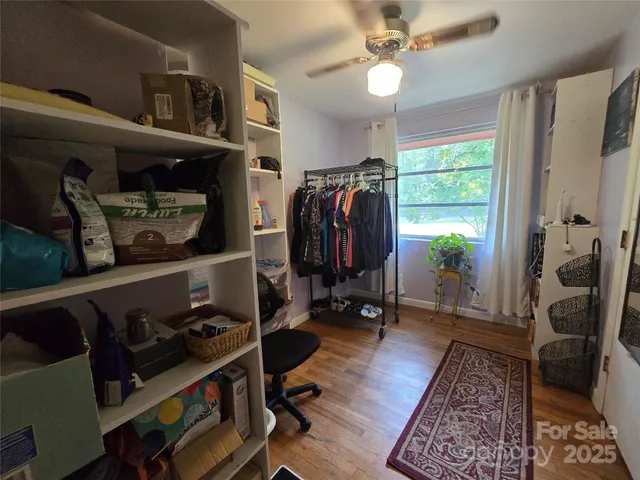 a view of a entryway with furniture and a rug
