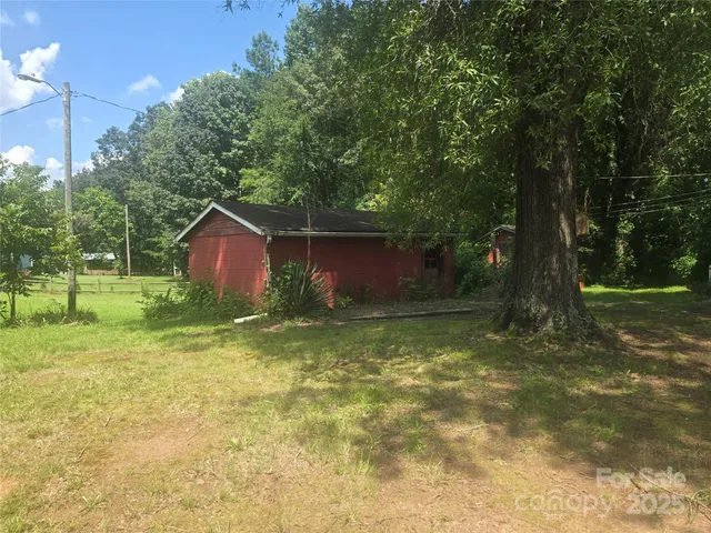 a view of backyard with green space