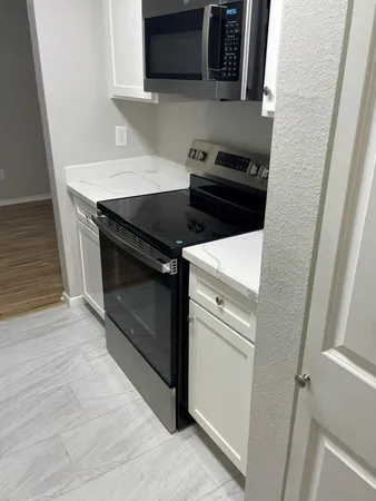 a close view of sink and refrigerator