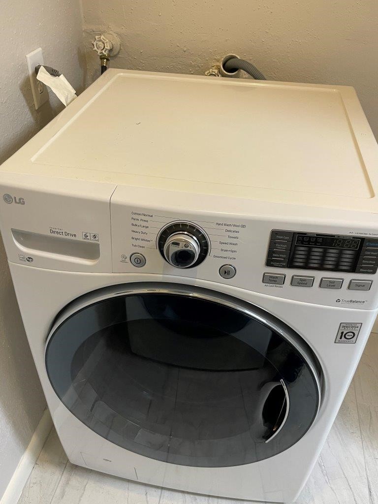3608 Ocee Street Houston, TX 77063 - Photo 16 of 31 a utility room with dryer and washer