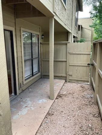 a bathroom with a white bath tub and a shower