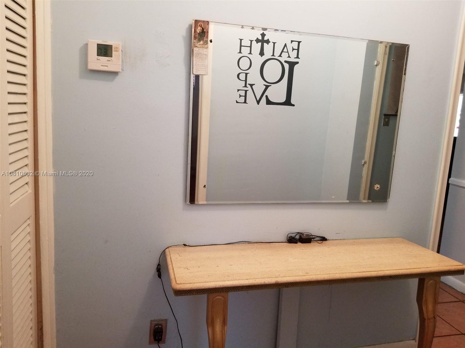 2001 North Park Road Hollywood, FL 33021 - Photo 26 of 49 hall in master suite, built in marble table, hall closet for more storage space