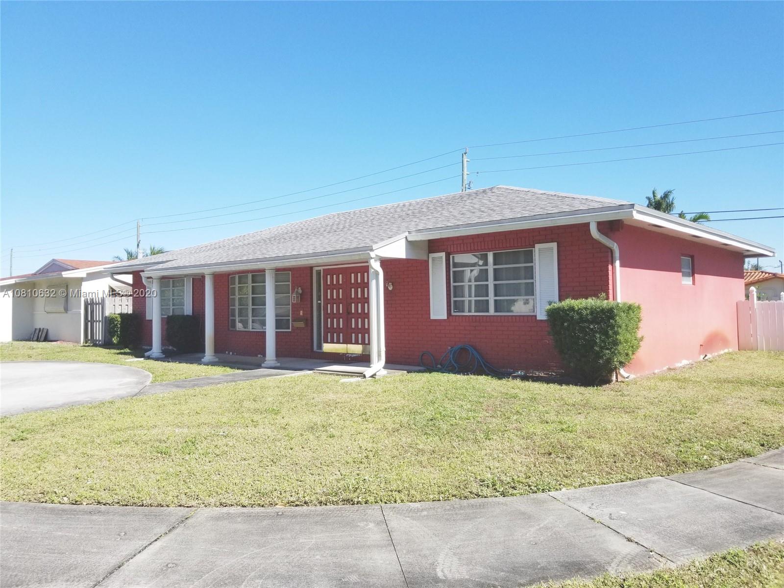 2001 North Park Road Hollywood, FL 33021 - Photo 28 of 49 front of house, faces west, circular driveway, front porch, dimensional fiberglass shingle roof