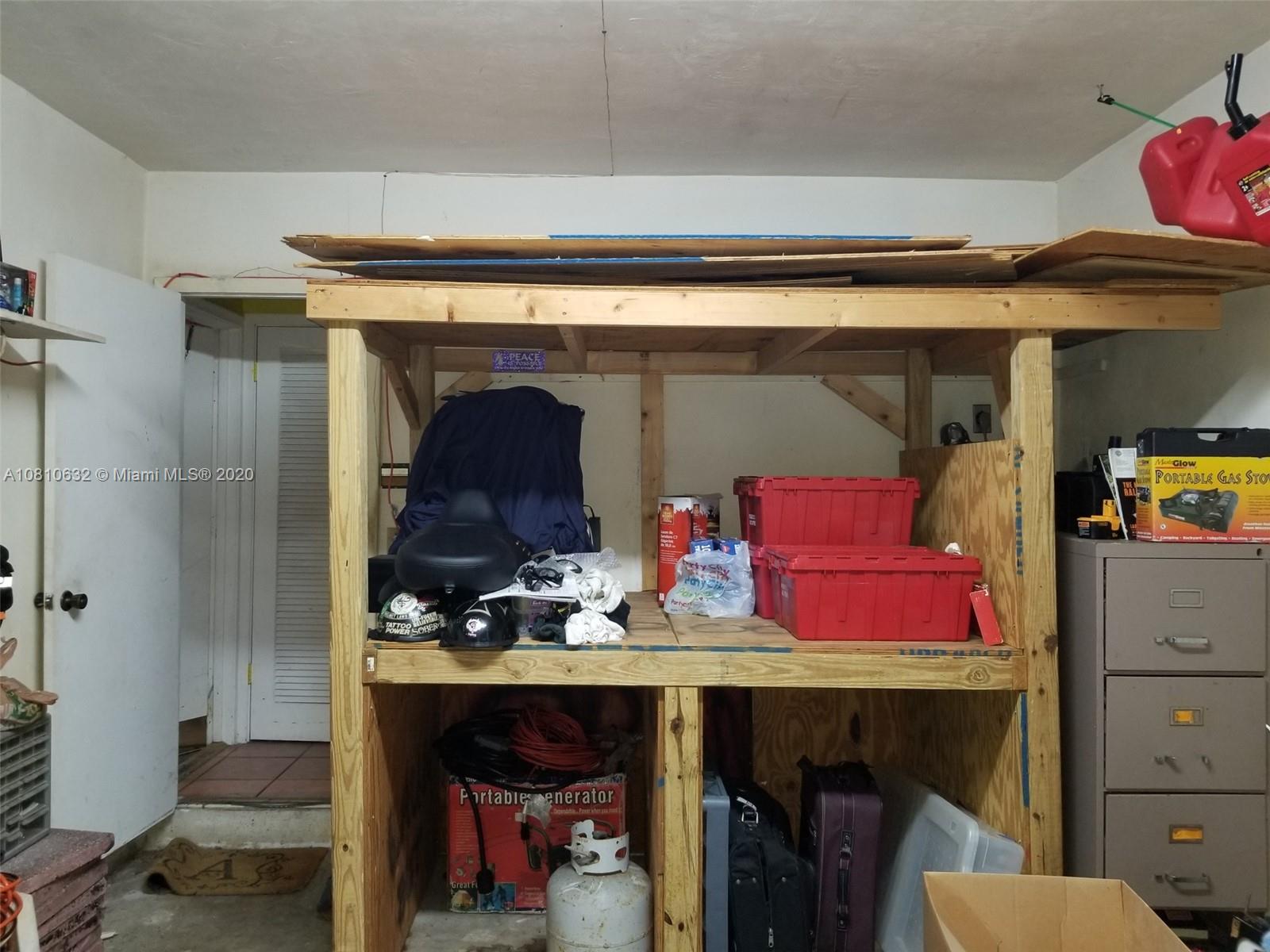 2001 North Park Road Hollywood, FL 33021 - Photo 43 of 49 storage shelves in one car garage