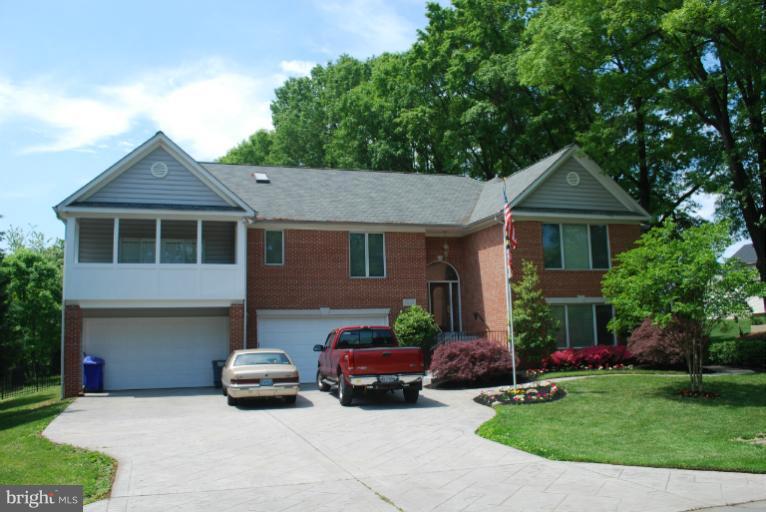 2925 Marlow Road Silver Spring, MD 20904 - Photo 1 of 20 a front view of a house with a garden and plants
