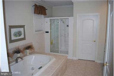 2925 Marlow Road Silver Spring, MD 20904 - Photo 11 of 20 a bathroom with a bathtub and shower