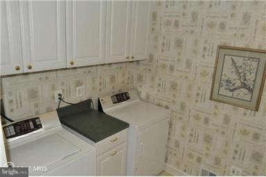 2925 Marlow Road Silver Spring, MD 20904 - Photo 18 of 20 a kitchen with a sink cabinets and utility