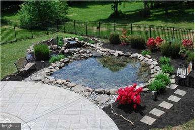2925 Marlow Road Silver Spring, MD 20904 - Photo 3 of 20 a view of a garden with flowers and trees