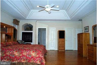2925 Marlow Road Silver Spring, MD 20904 - Photo 8 of 20 a bedroom with furniture and a ceiling fan