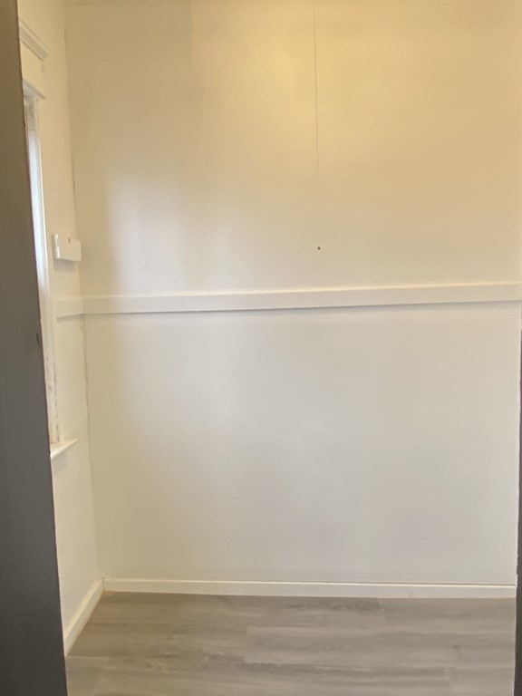 41-43 Lester Street Springfield, MA 01108 - Photo 11 of 25 a view of a closet with wooden floor