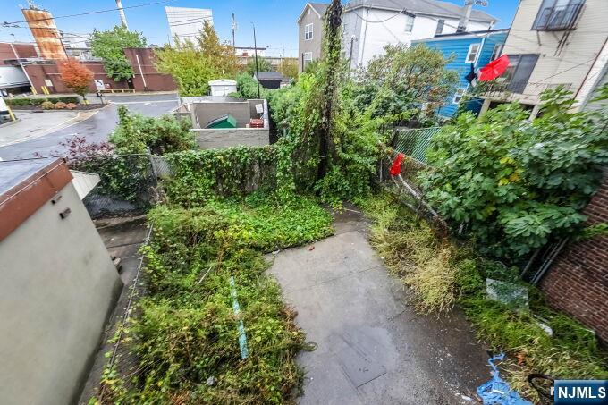 743 Harrison Avenue Harrison, NJ 07029 - Photo 31 of 50 a view of flowers and flowers in a yard