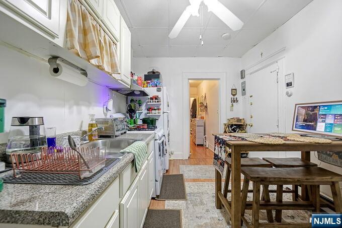 743 Harrison Avenue Harrison, NJ 07029 - Photo 34 of 50 a kitchen with granite countertop lots of counter top space