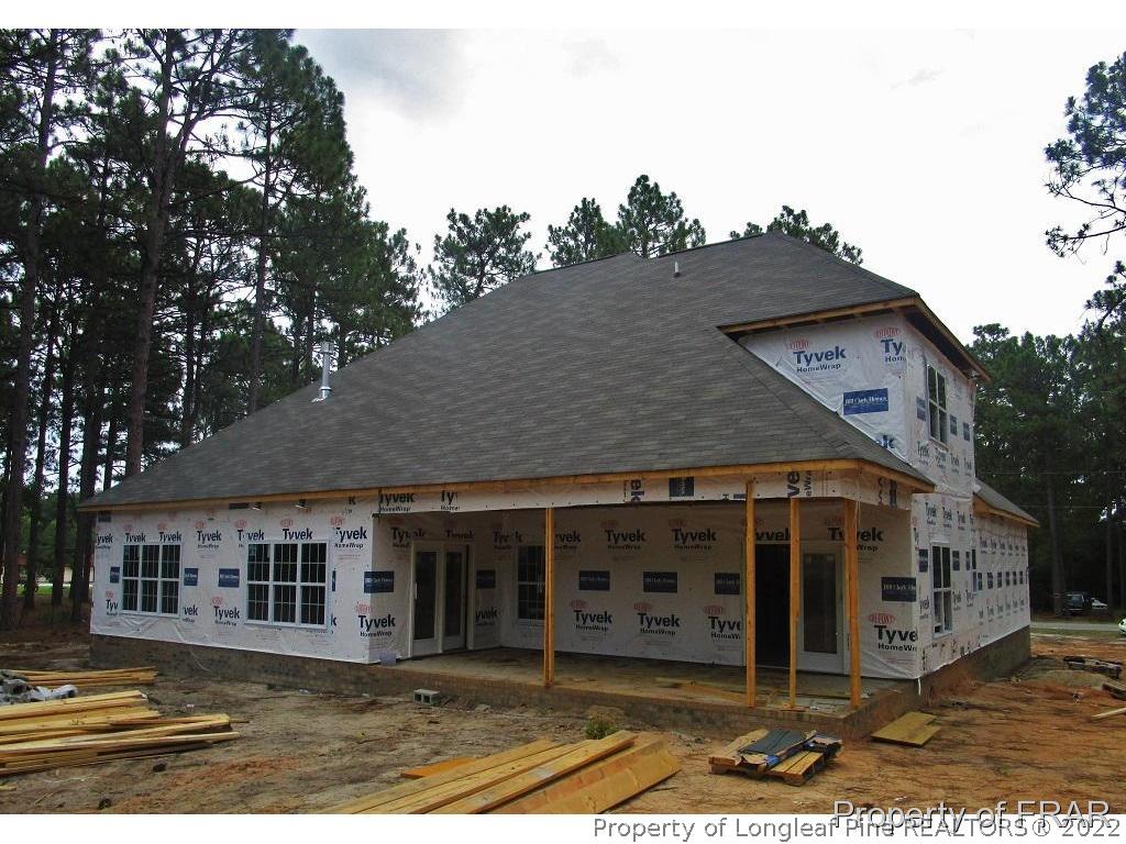 604 Longleaf Road Aberdeen, NC 28315 - Photo 3 of 8 a front view of a house with a porch