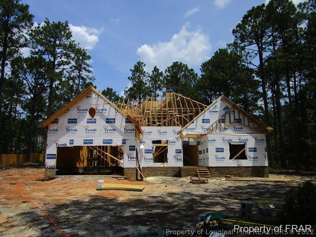 604 Longleaf Road Aberdeen, NC 28315 - Photo 4 of 8 a front view of a house with a yard