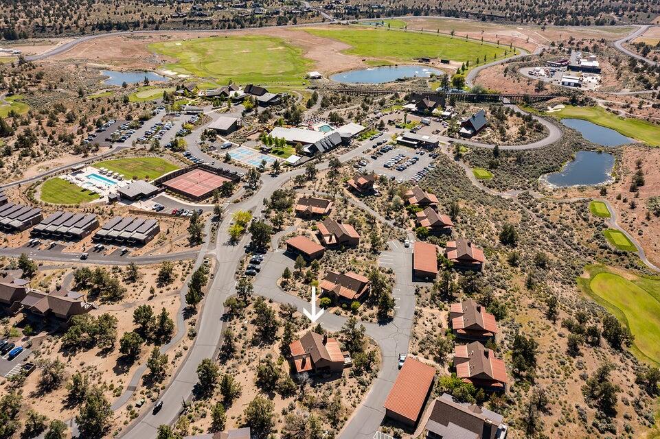 16845 South W Brasada Ranch Road, Unit 23 Powell Butte, OR 97753 - Photo 3 of 47 an aerial view of residential houses with outdoor space