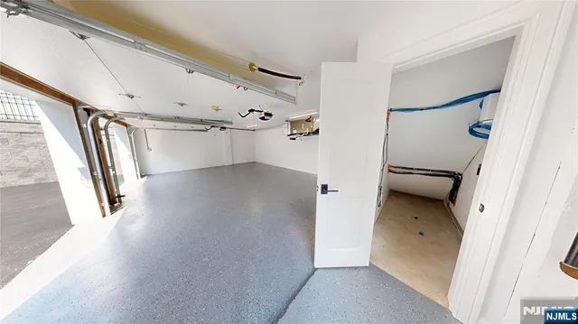 a view of a hallway view with staircase