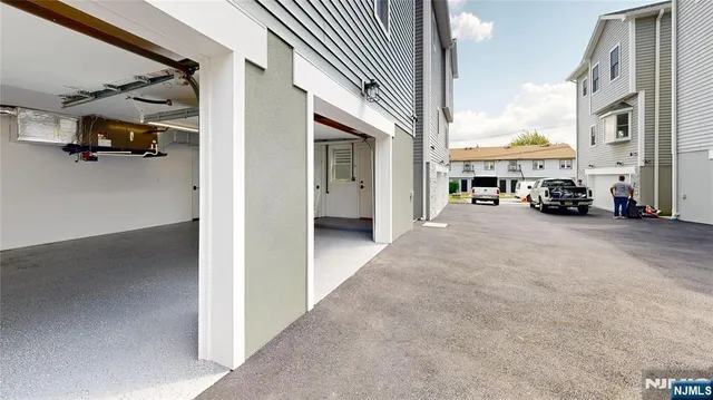 a view of a street with cars