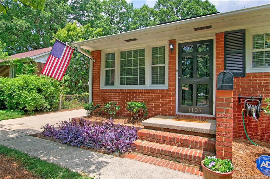4137 Applegate Road Charlotte, NC 28209 - Photo 2 of 44 a front view of a house with a yard