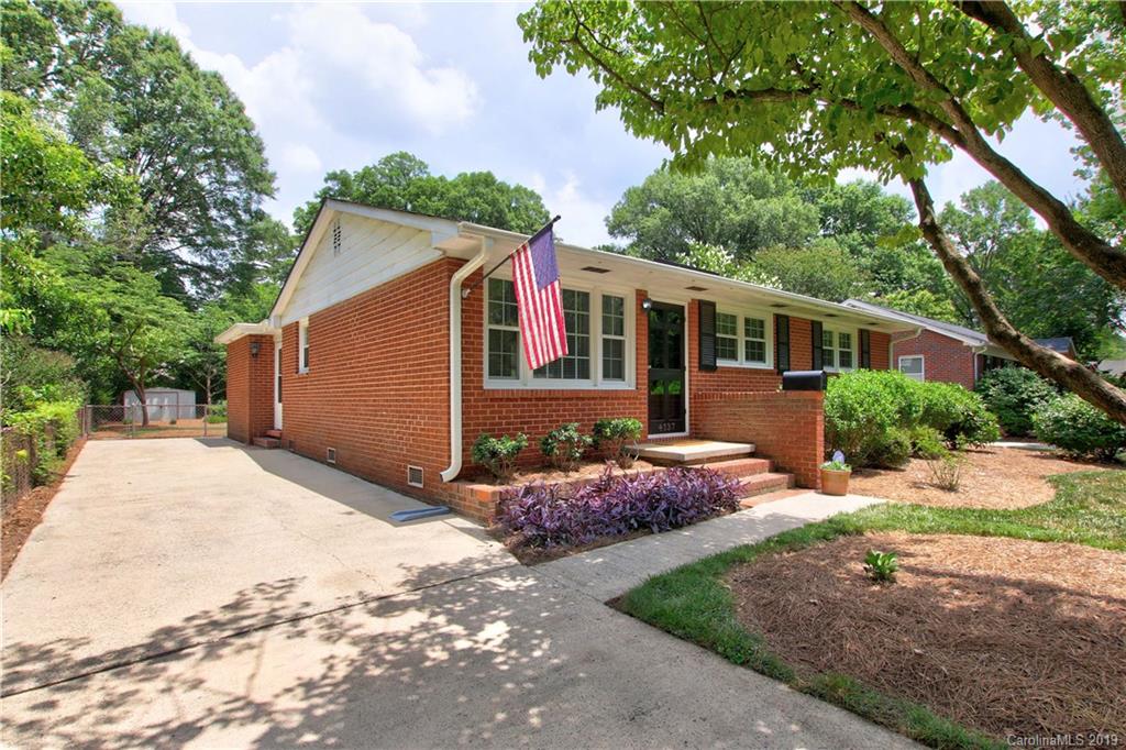 4137 Applegate Road Charlotte, NC 28209 - Photo 3 of 44 a front view of a house with a yard