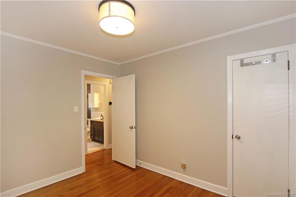 4137 Applegate Road Charlotte, NC 28209 - Photo 25 of 44 a view of a room with wooden floor
