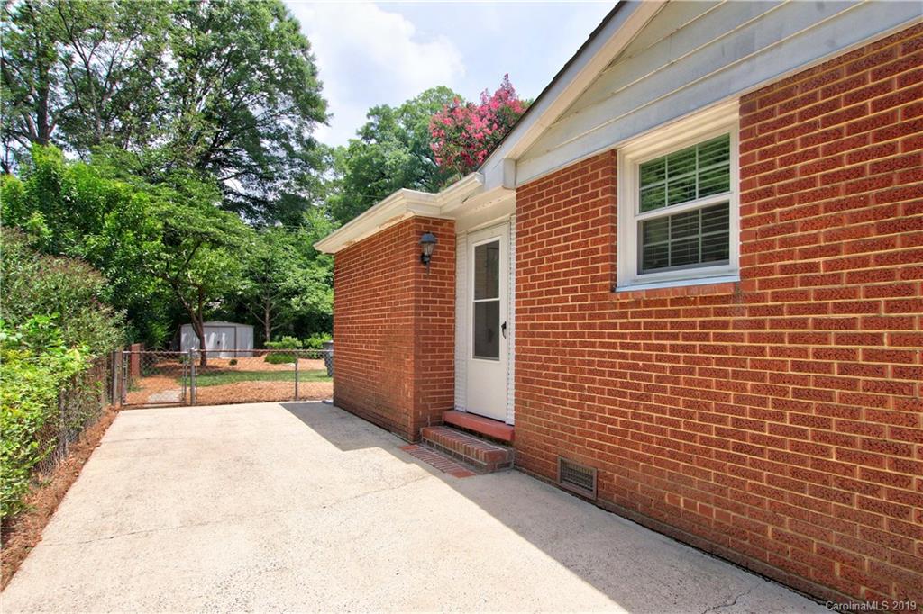 4137 Applegate Road Charlotte, NC 28209 - Photo 4 of 44 a view of a house with backyard and sitting area