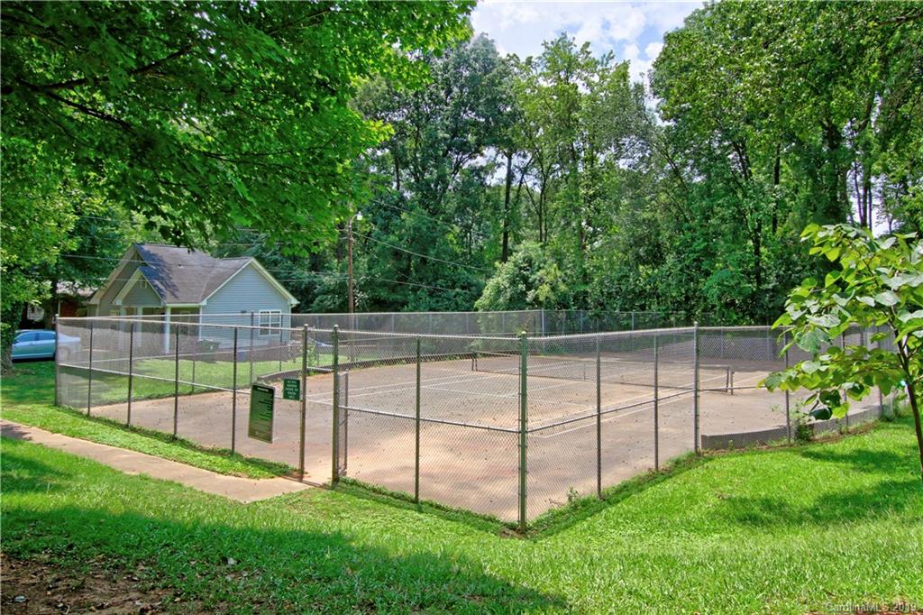 4137 Applegate Road Charlotte, NC 28209 - Photo 40 of 44 a view of a backyard with a garden and deck