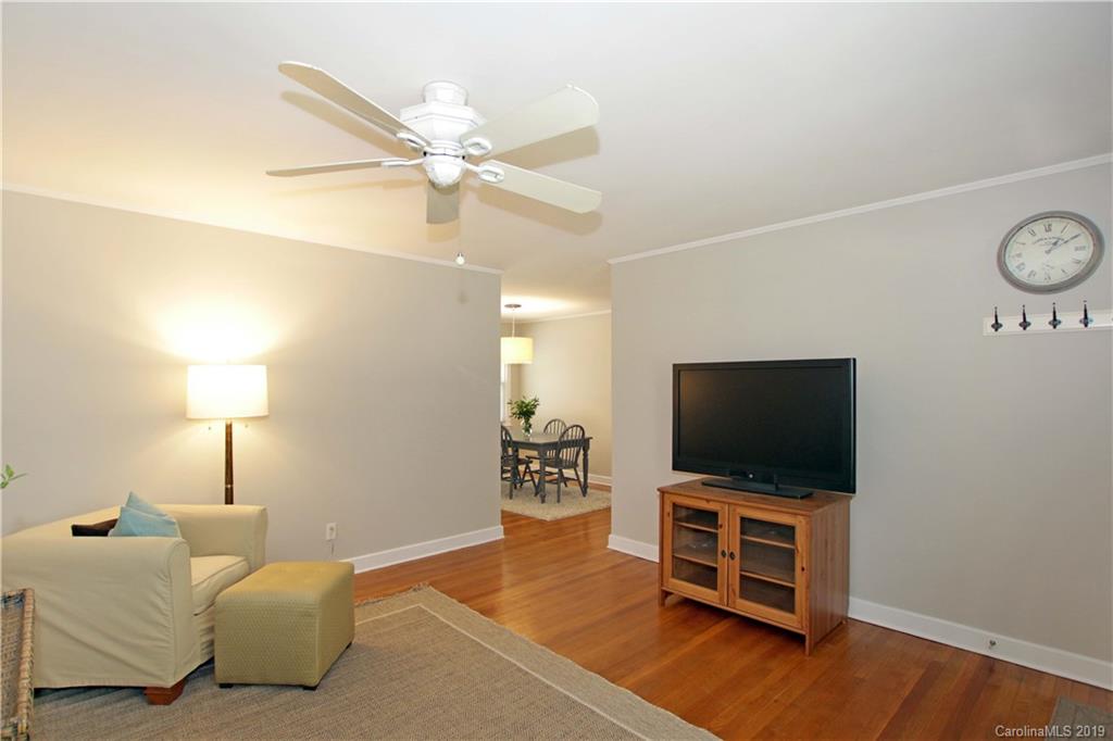 4137 Applegate Road Charlotte, NC 28209 - Photo 8 of 44 a living room with furniture and a flat screen tv