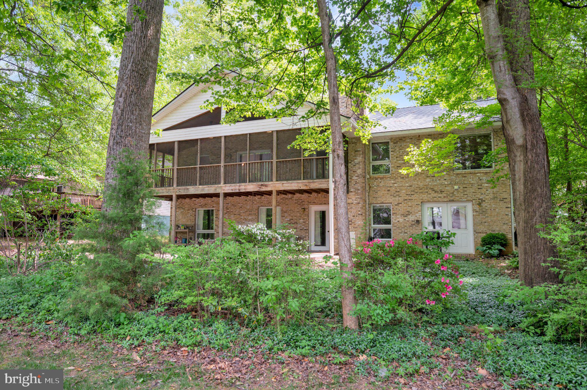 110 Federal Road Locust Grove, VA 22508 - Photo 12 of 77 a front view of a house with a garden