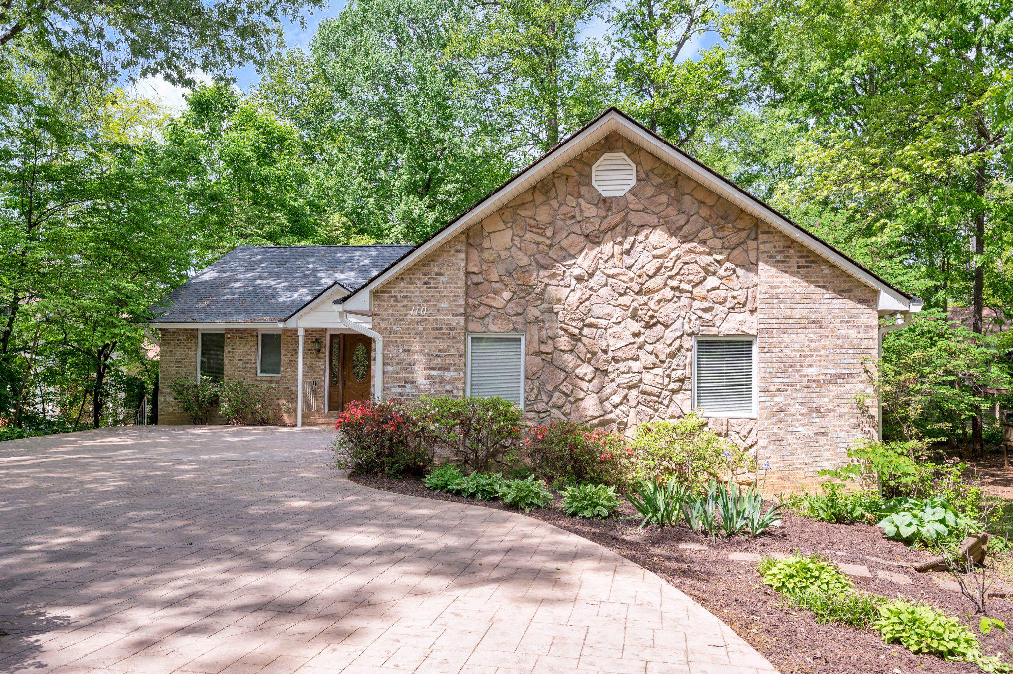 110 Federal Road Locust Grove, VA 22508 - Photo 2 of 77 a front view of a house with a garden