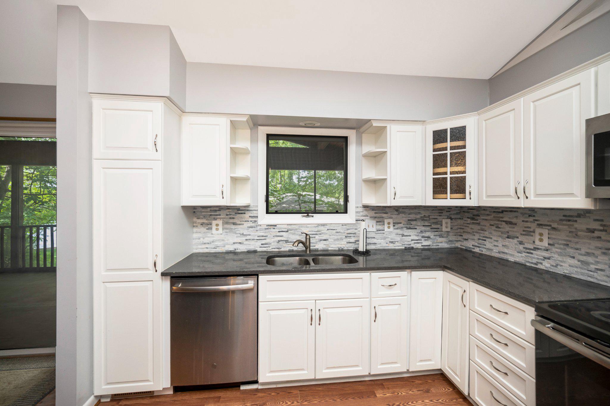 110 Federal Road Locust Grove, VA 22508 - Photo 29 of 77 a kitchen with cabinets appliances and a window