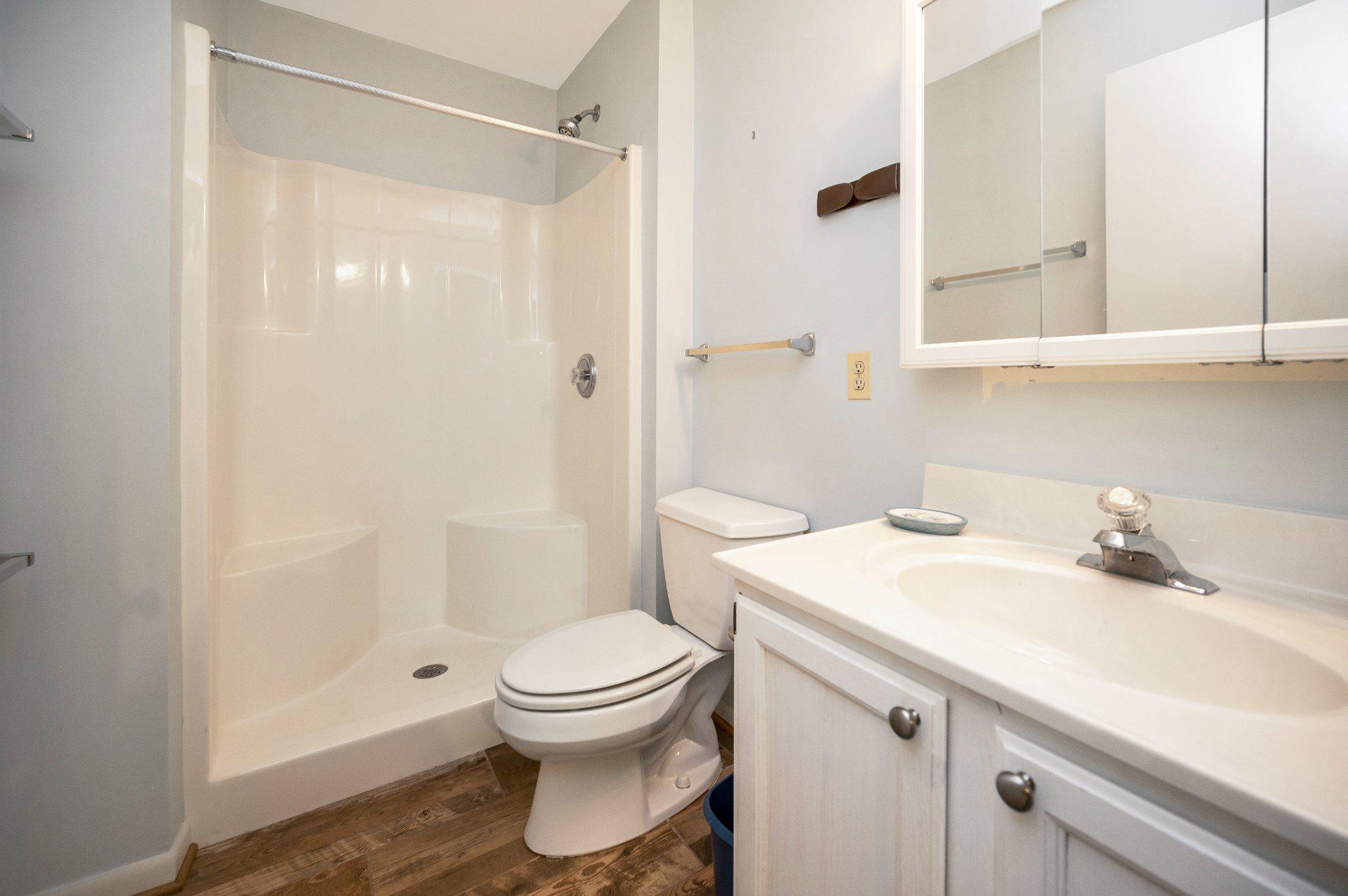 110 Federal Road Locust Grove, VA 22508 - Photo 49 of 77 a bathroom with a sink toilet and shower