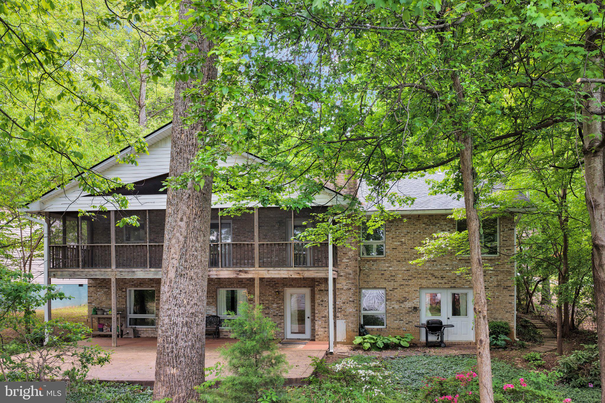 110 Federal Road Locust Grove, VA 22508 - Photo 60 of 77 a front view of a house with a tree