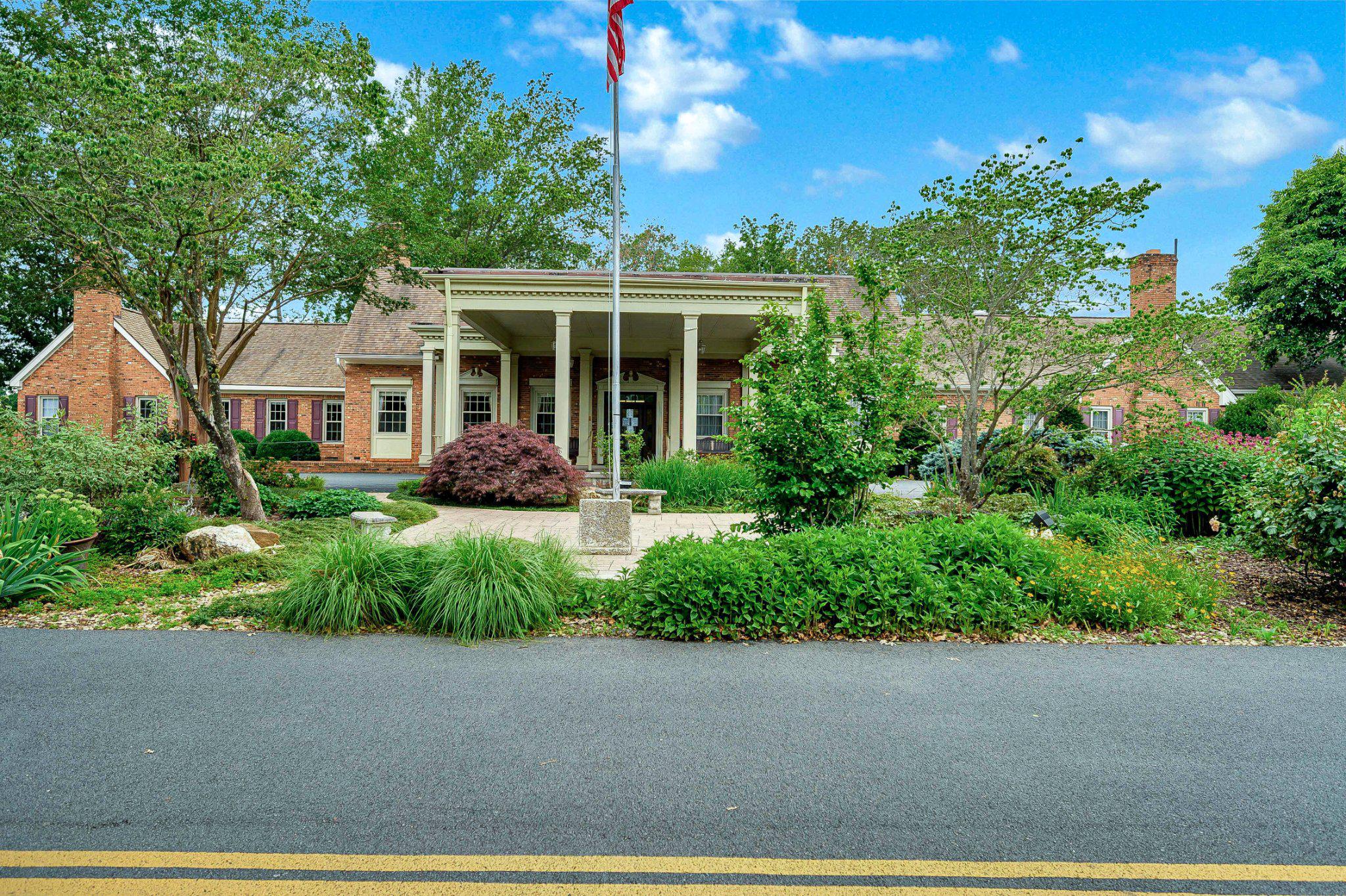 110 Federal Road Locust Grove, VA 22508 - Photo 64 of 77 a front view of a house with a yard and potted plants