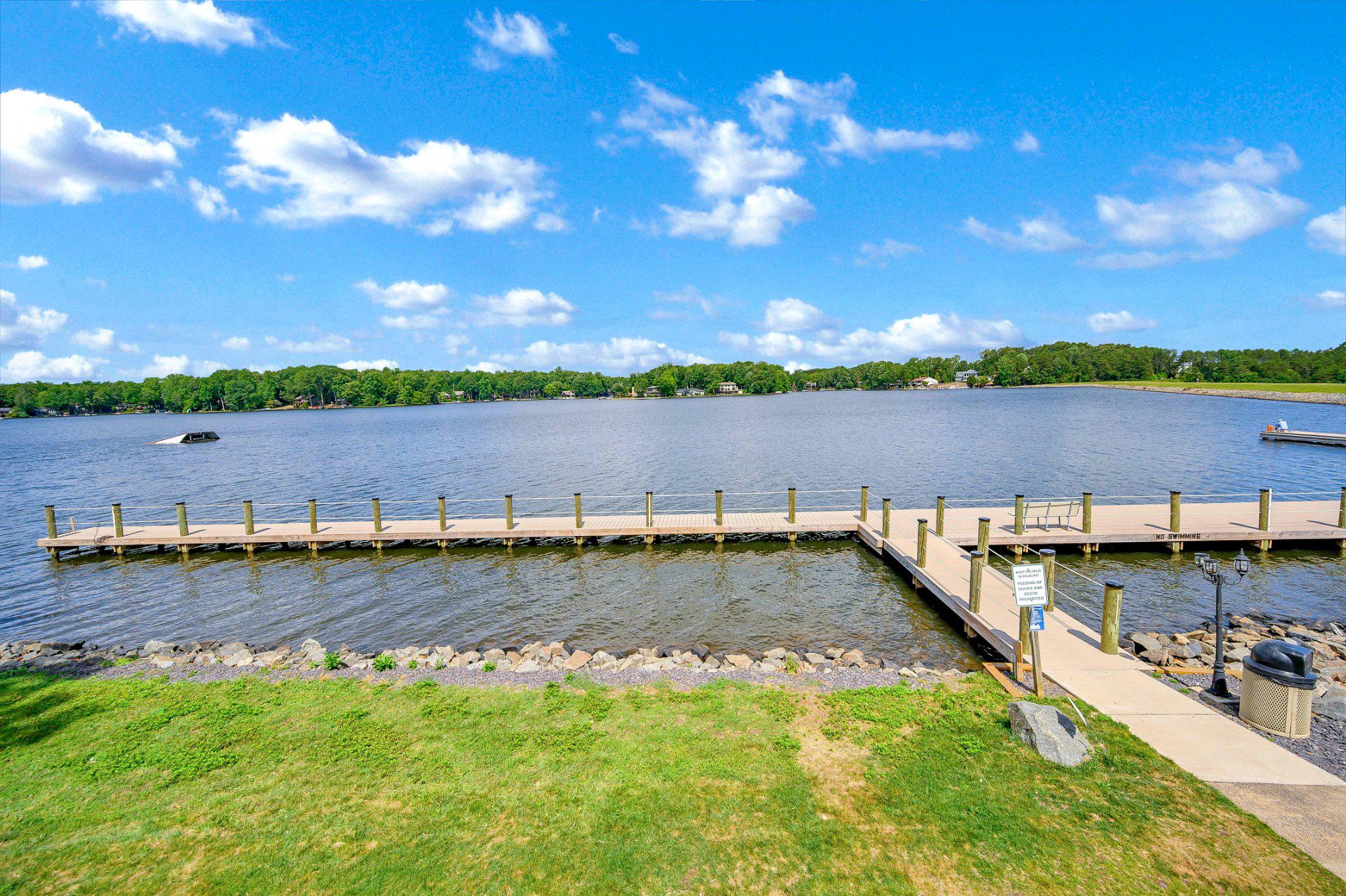 110 Federal Road Locust Grove, VA 22508 - Photo 66 of 77 a view of a lake with houses in the background