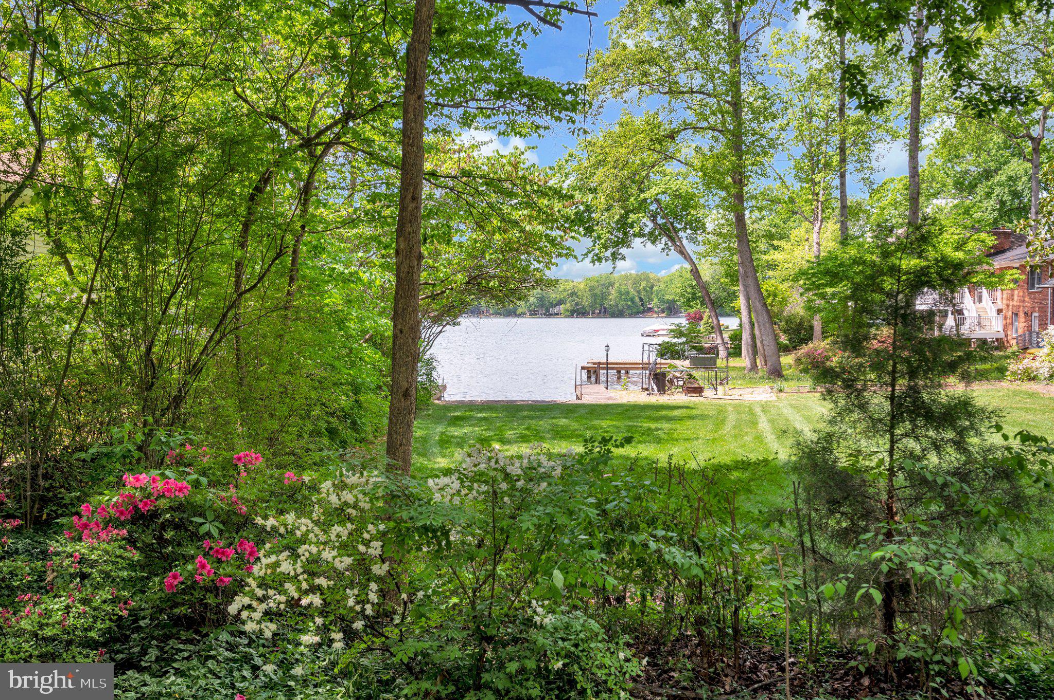 110 Federal Road Locust Grove, VA 22508 - Photo 7 of 77 a backyard of a house with lots of green space and chair