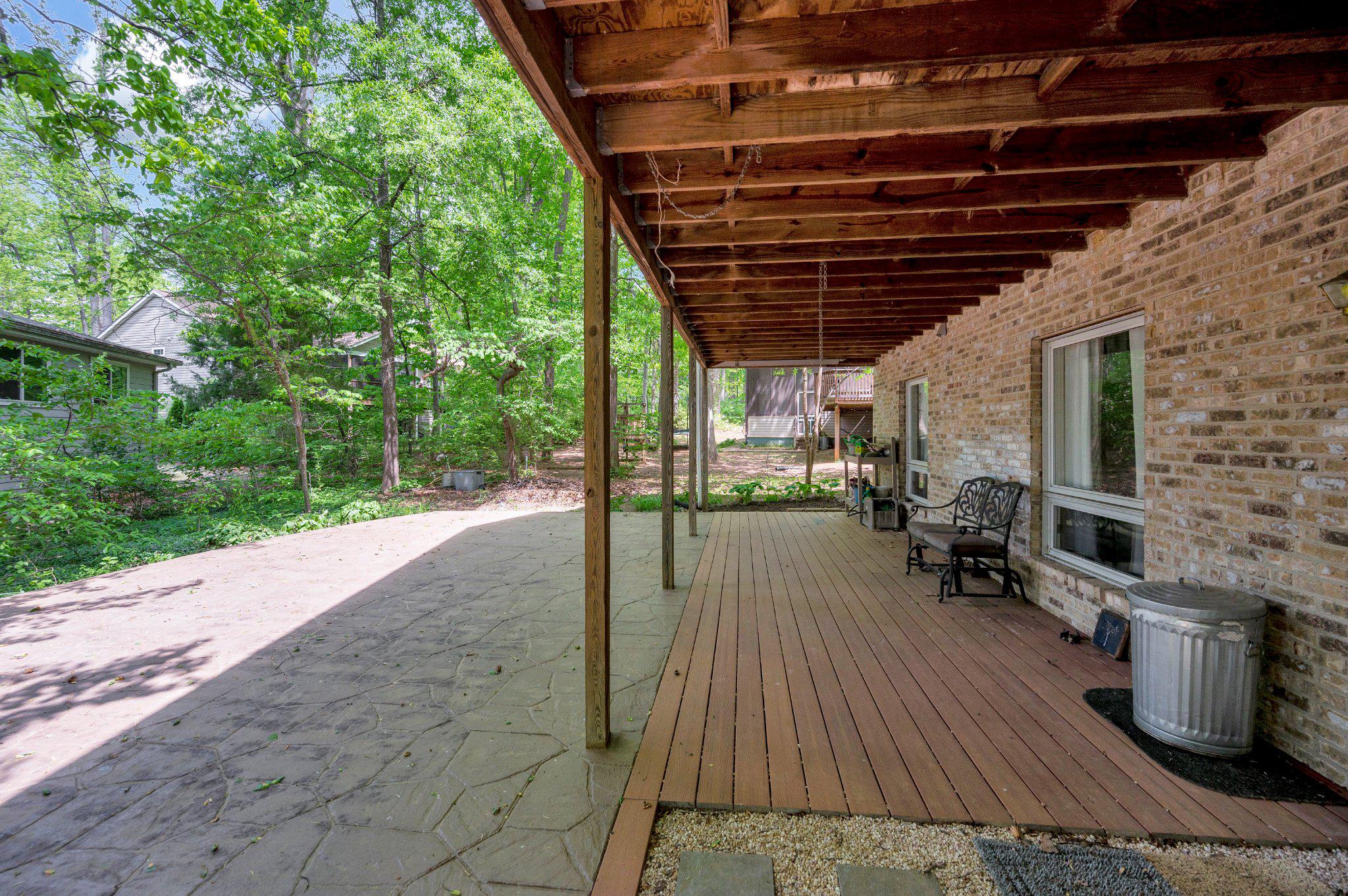 110 Federal Road Locust Grove, VA 22508 - Photo 10 of 77 a view of a patio with table and chairs with wooden floor and fence