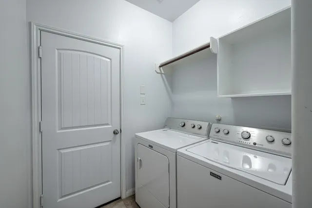 a view of a house with a big yard couches and garden